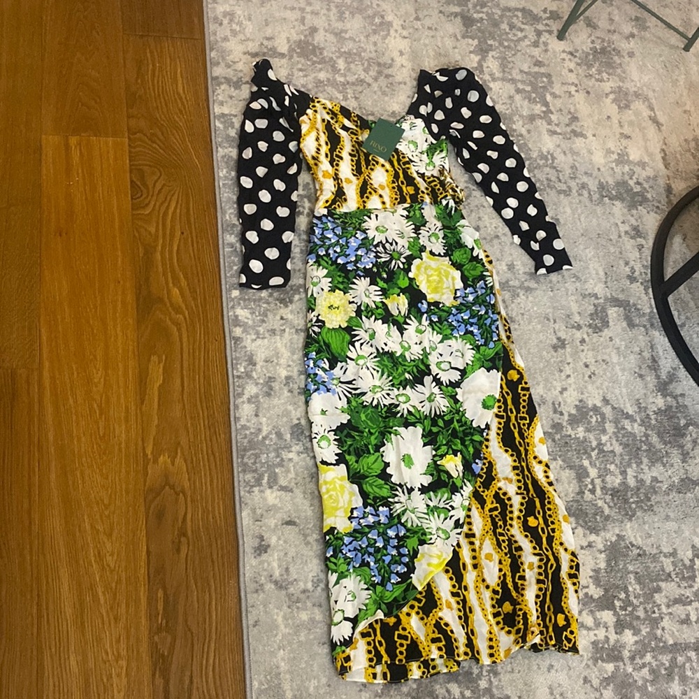 Beautiful brand new Rixo dress size (UK 6)US 2. Great condition never worn.